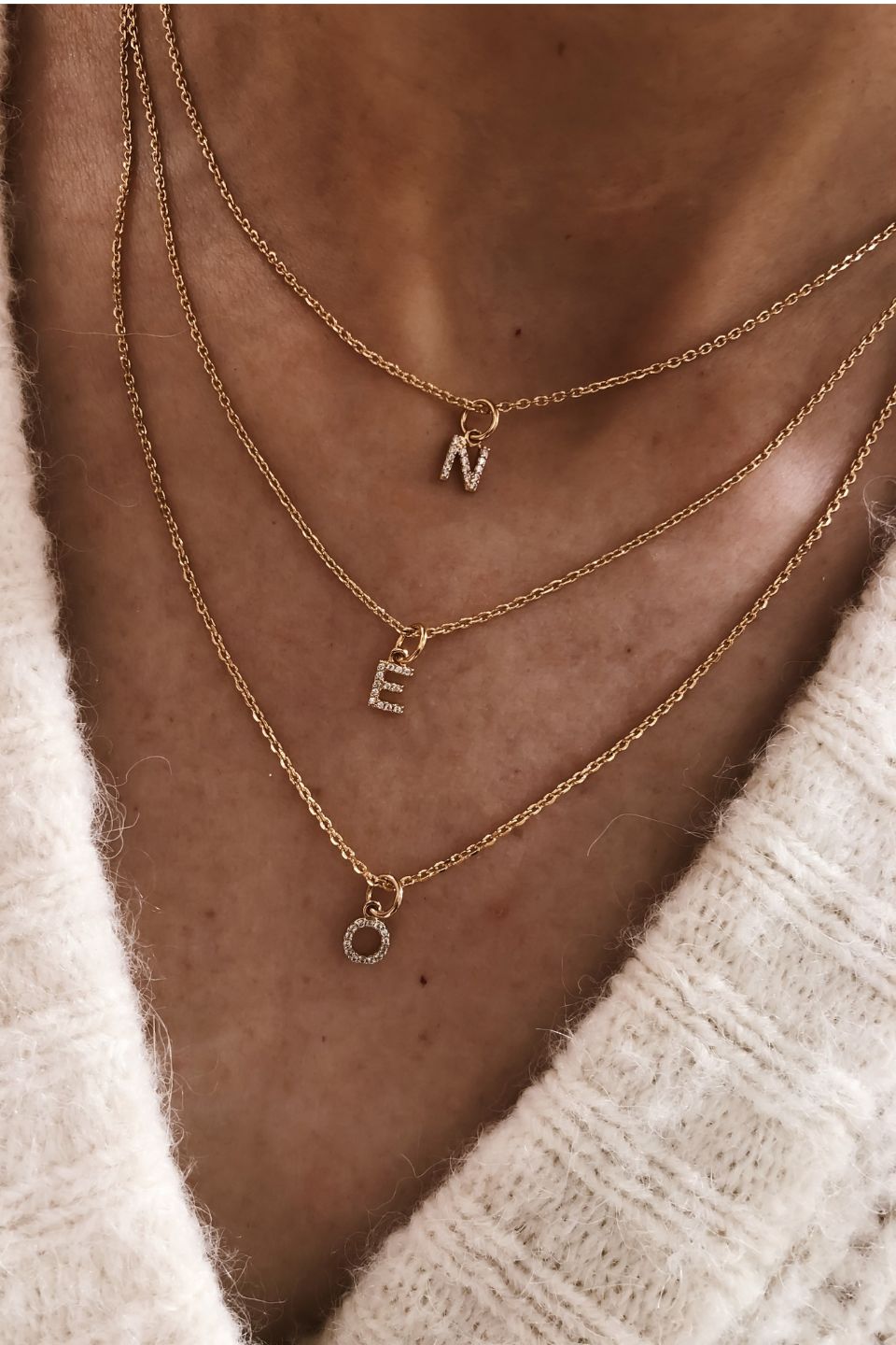 Pendentif lettre sertie
